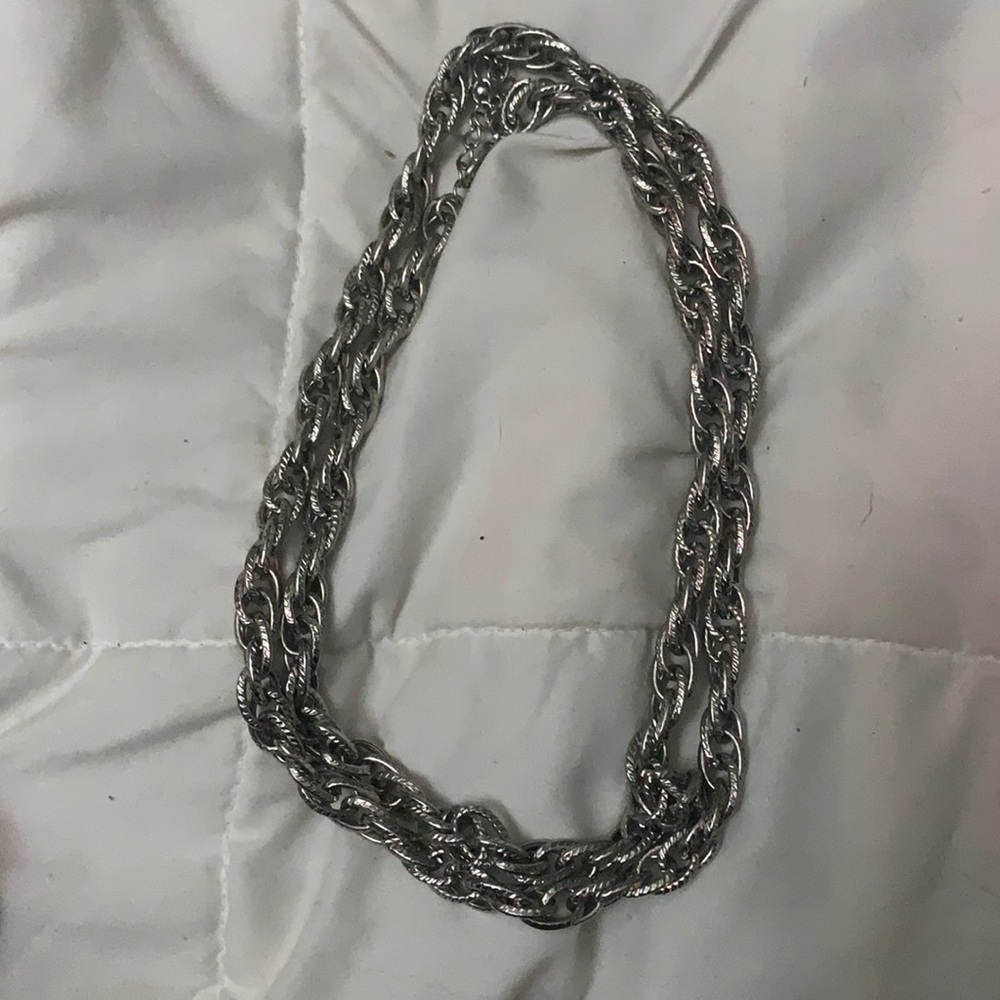Silver chain necklace long or folded  makes it look like two chains.🙂